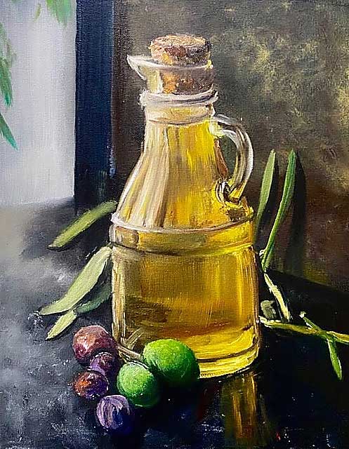Olive oil bottle with olives